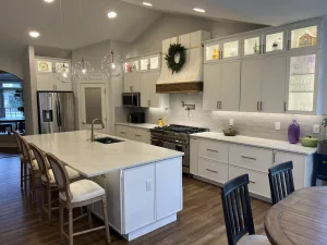 Kitchen Remodeling in Aldie, VA Jeff P. 6 Painted Vanilla cabinets, glass pendant lights and quartz island in an Aldie kitchen