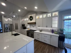 Kitchen Remodeling in Aldie, VA Jeff P. 7 Quartz island sink looking toward the range wall and statement hood in Aldie, VA