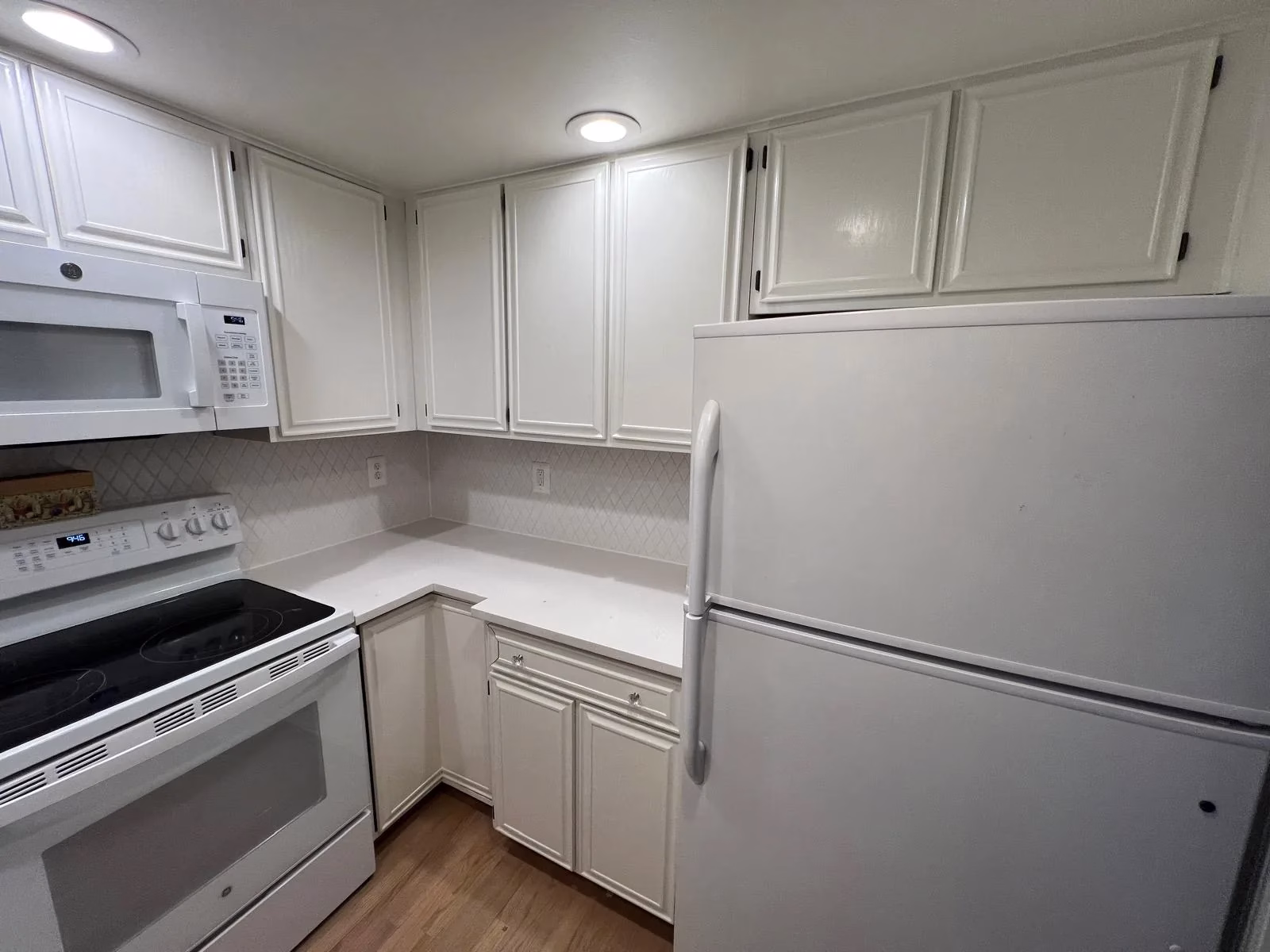 Open-Concept Kitchen Remodeling with Navy Backsplash in Arlington, VA | Erin L. Project — before