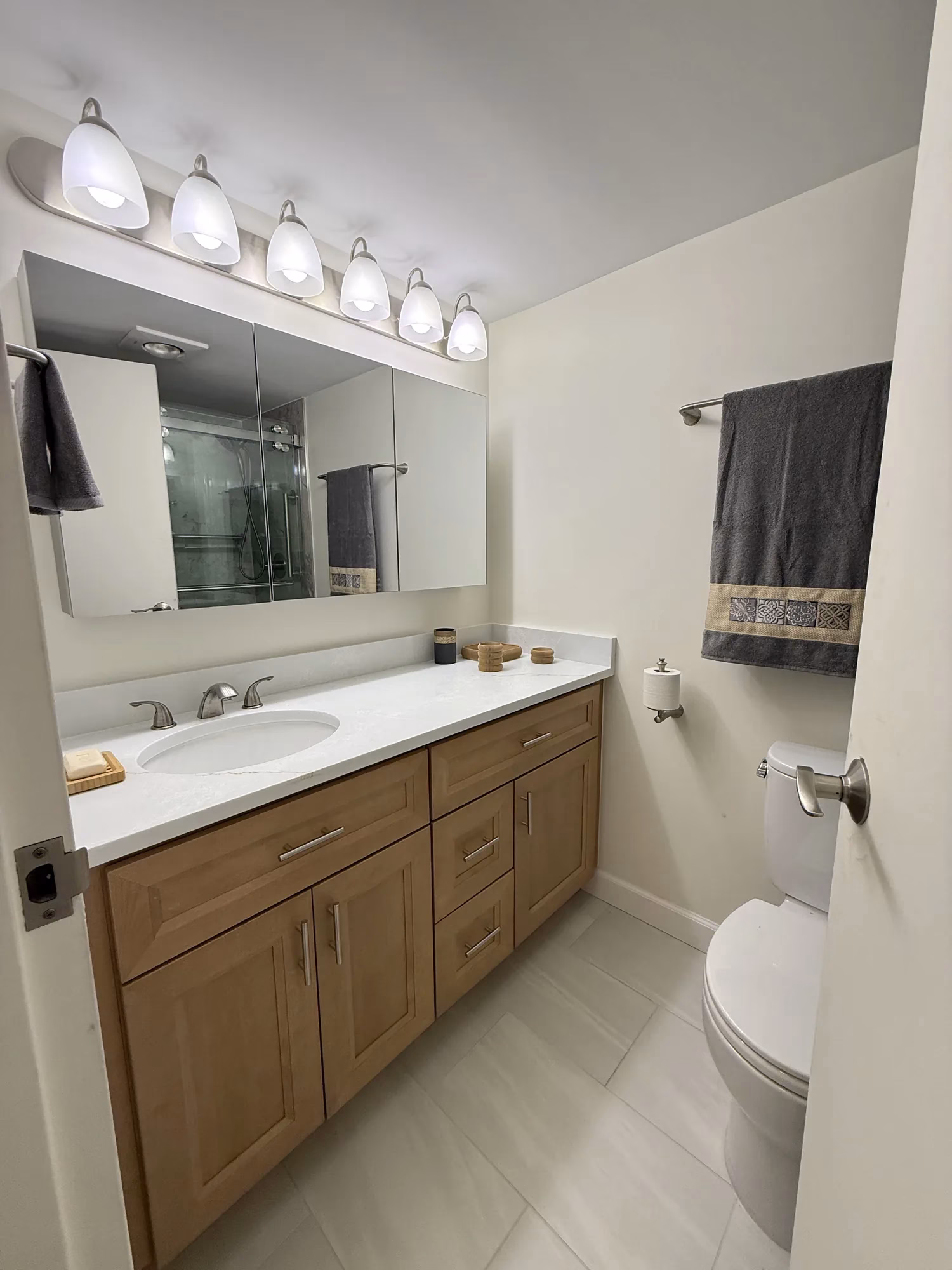 High-Rise Dual Bathroom Remodeling in Arlington, VA | Nancy H. Project — after