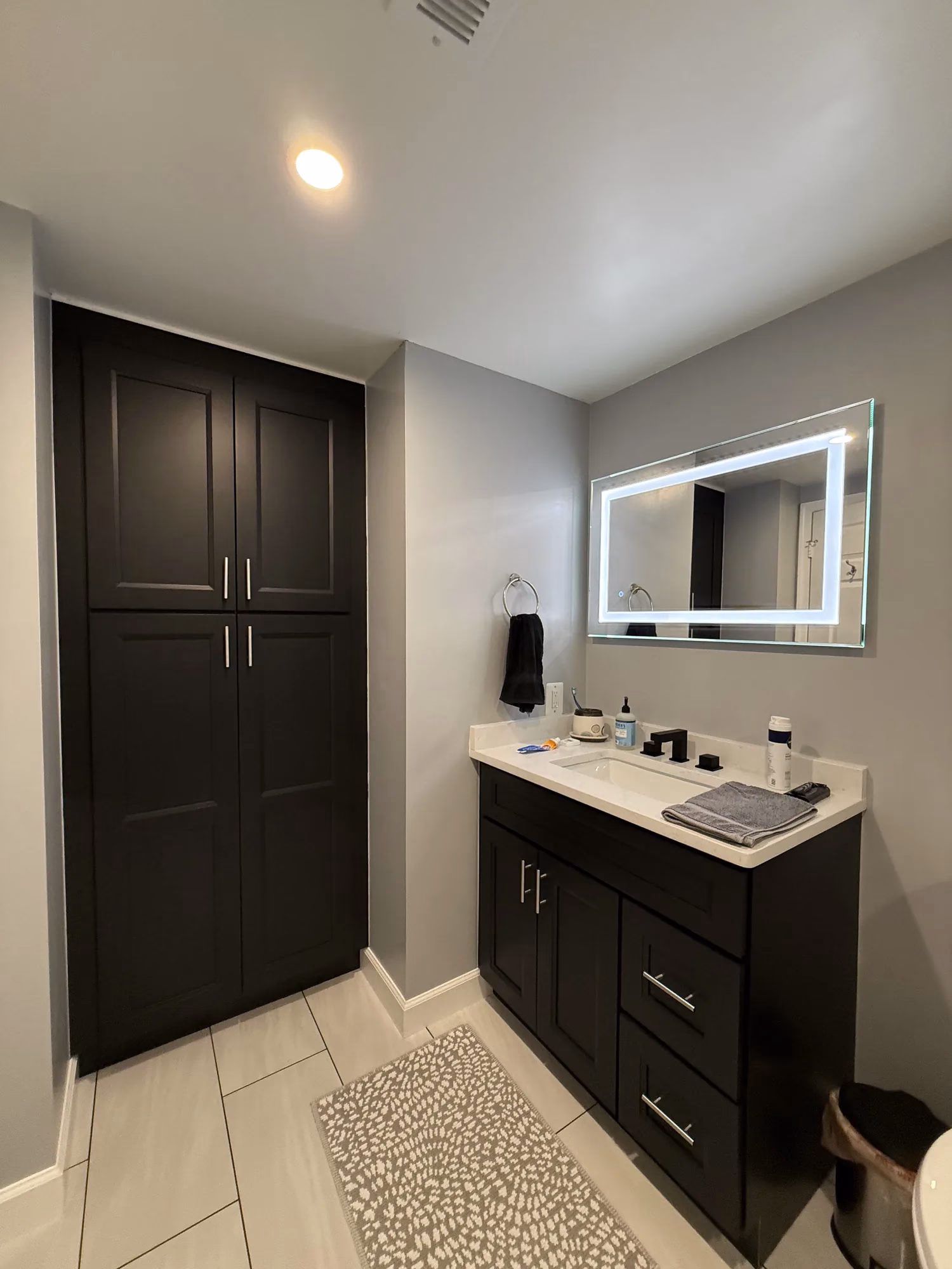 Black Cabinetry and Hexagon Tile Bathroom Remodeling in Arlington, VA | Steve M. Project — after